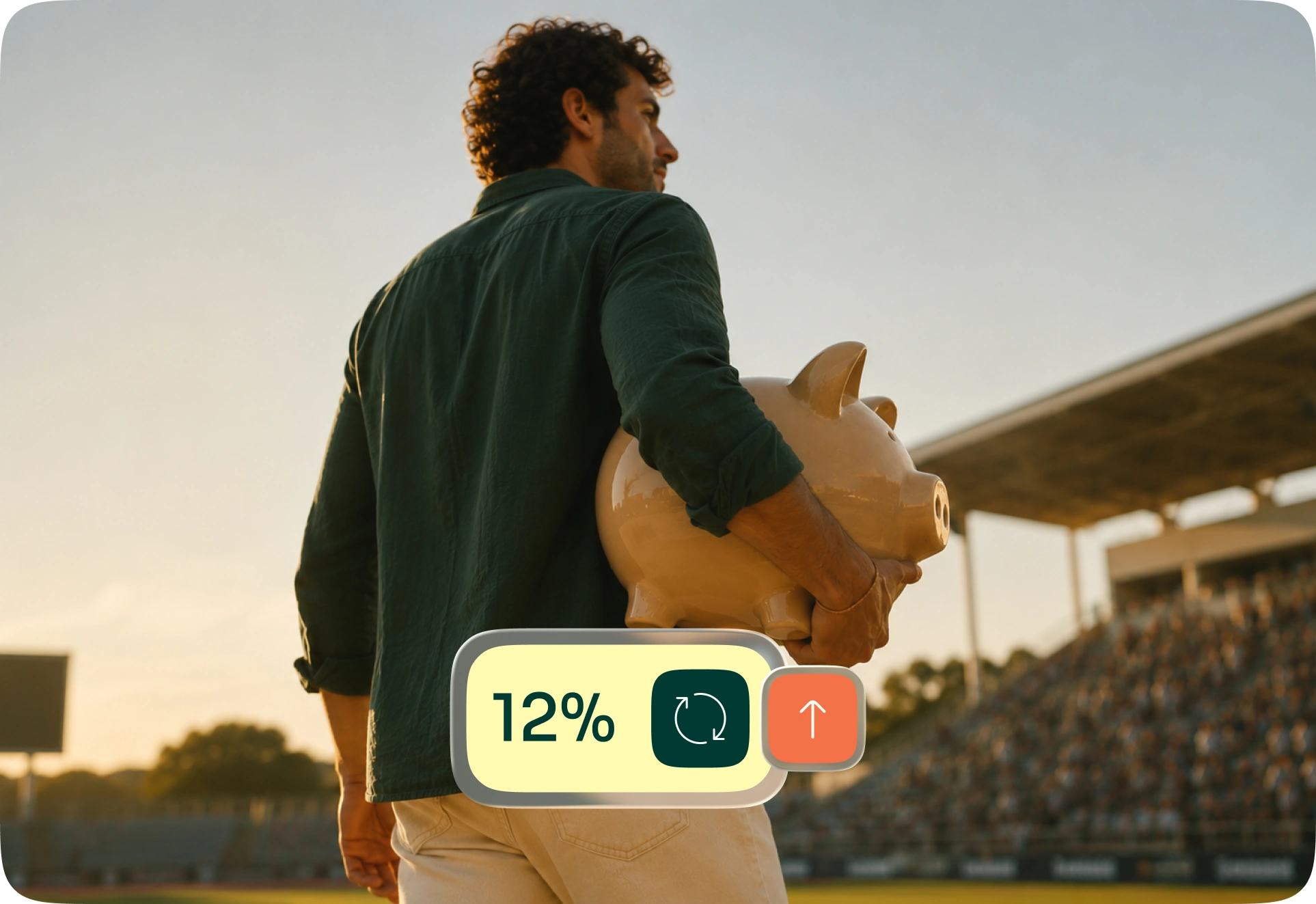 A man carrying a giant piggy bank across a stadium pitch; a badge reads 12%