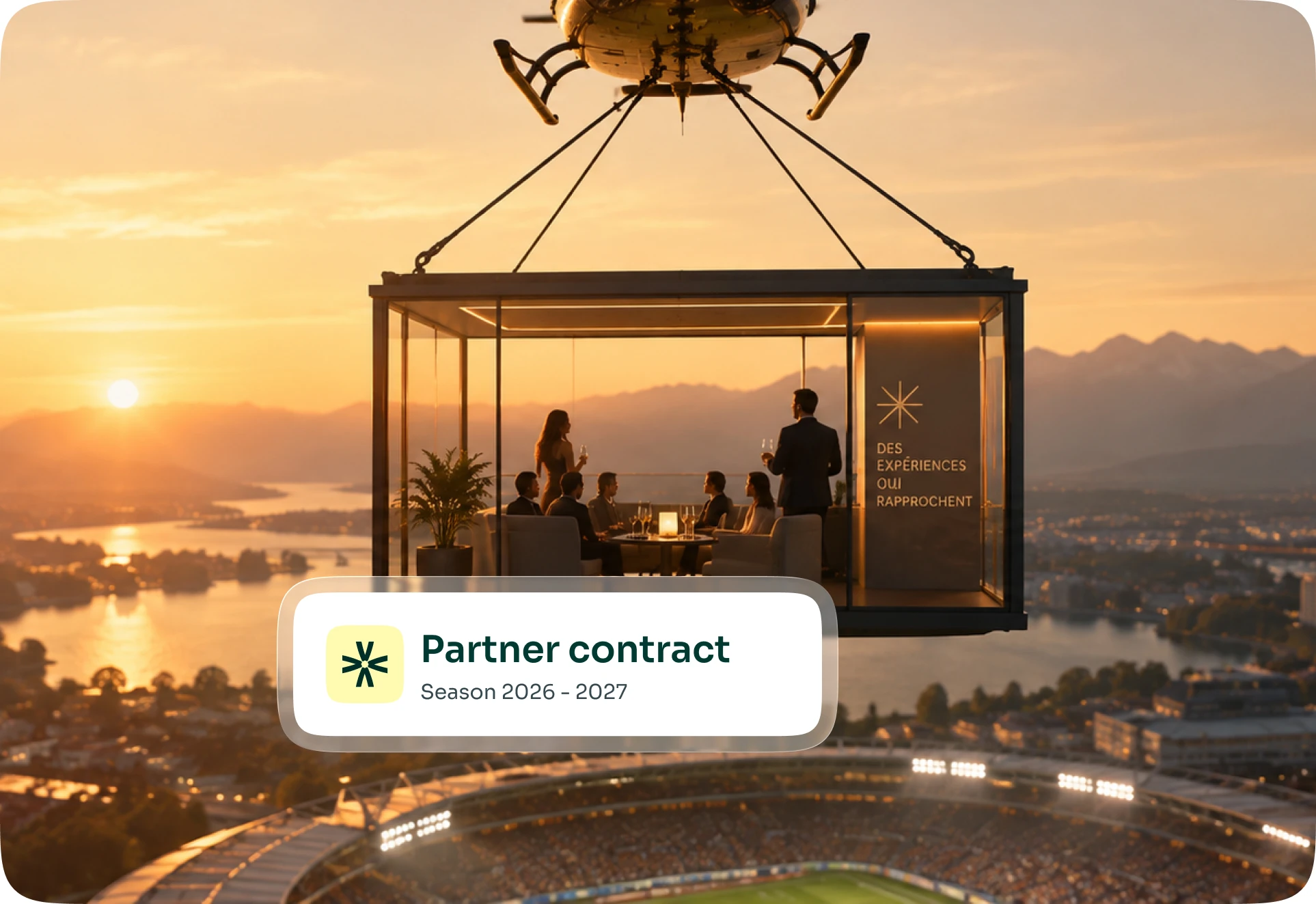 A lounge suspended from a helicopter above a stadium at sunset, with a partner contract label for the 2026-2027 season